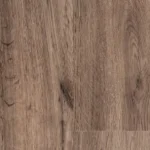 Close-up of warm brown wood grain texture on SPC flooring
