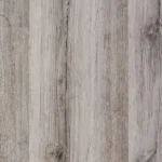 Close-up of weathered grey wood-look SPC flooring texture