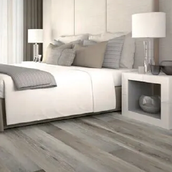 Wood-look SPC plank flooring with a distressed gray