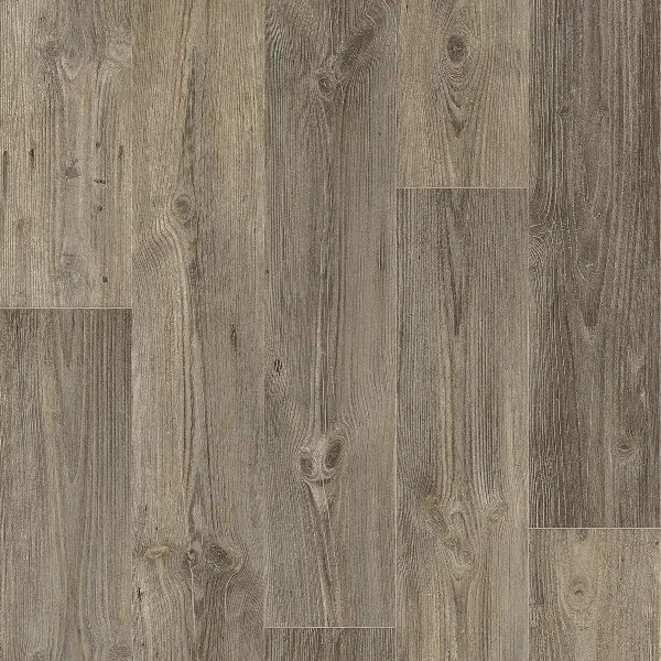 Close-up of distressed, gray-brown wood-look vinyl plank flooring.