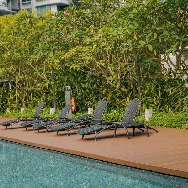 Solid core WPC flooring planks with a realistic light brown wood grain finish.