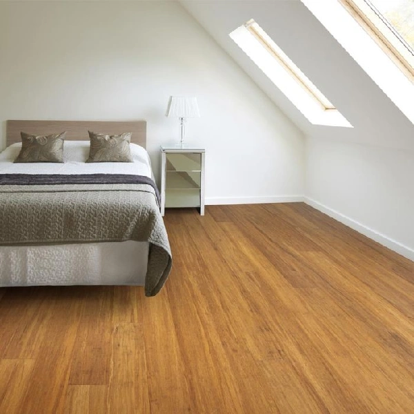 Warm golden plank bamboo bedroom flooring.