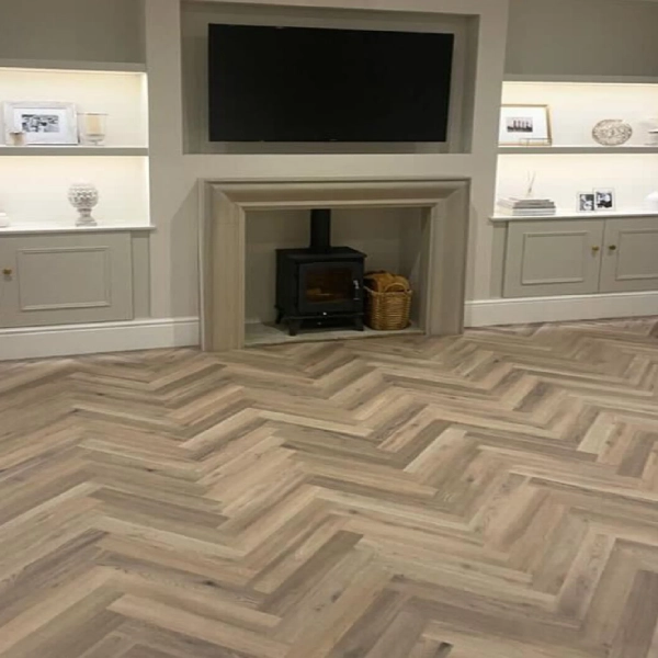 Wide plank light oak LVT flooring installed