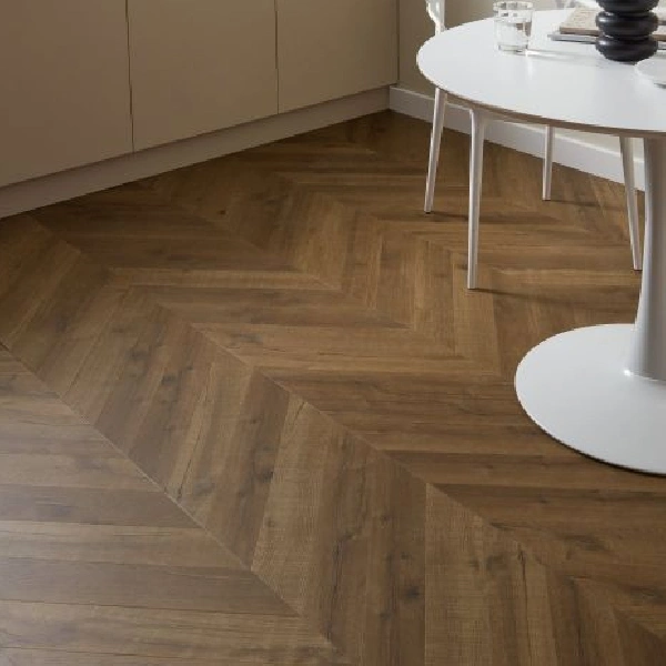 Wood-look vinyl in a dark brown chevron pattern.