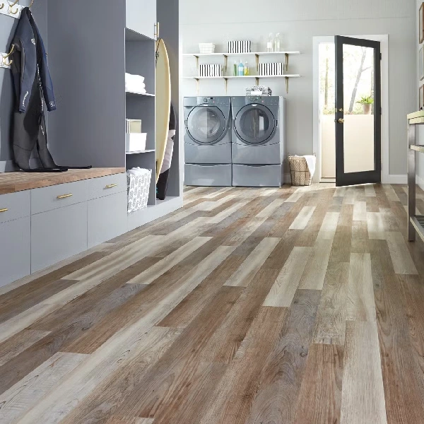 Wood-look vinyl plank flooring in a laundry room.