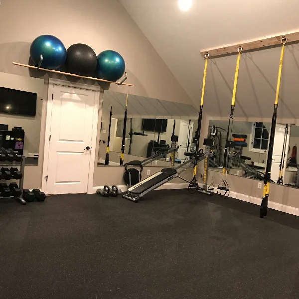 black rubber mat gym flooring in a home gym.