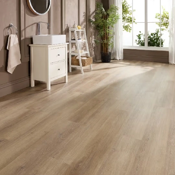brown wood-effect vinyl click flooring in a bright bathroom.