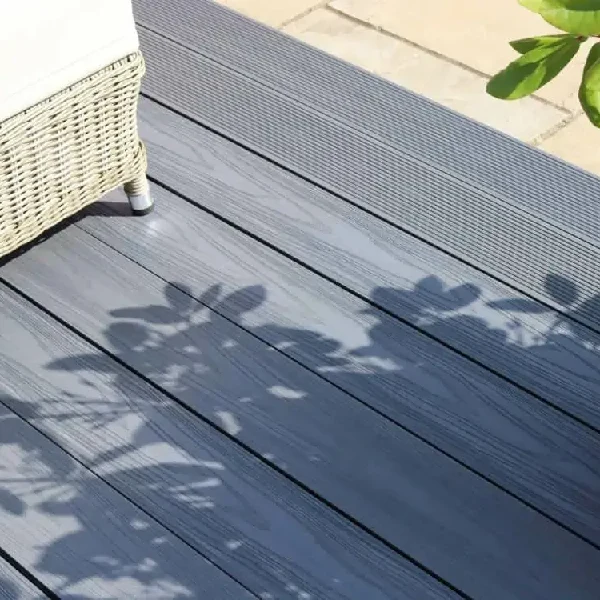 gray reversible WPC decking planks, showing wood grain texture