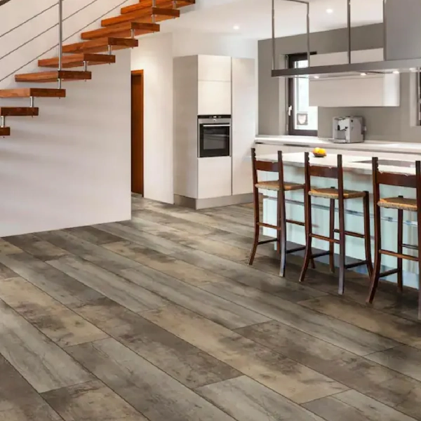 grey wood-effect vinyl click plank flooring in a modern kitchen