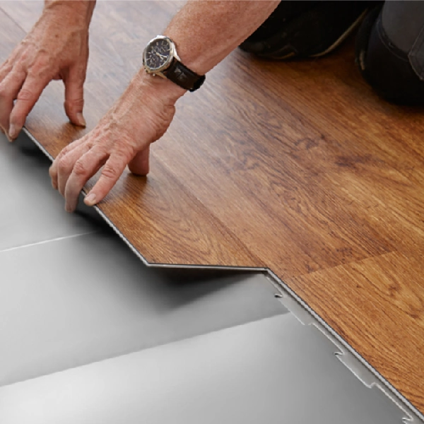 loose lay wood-plastic composite (WPC) flooring plank, which features a wood-grain pattern