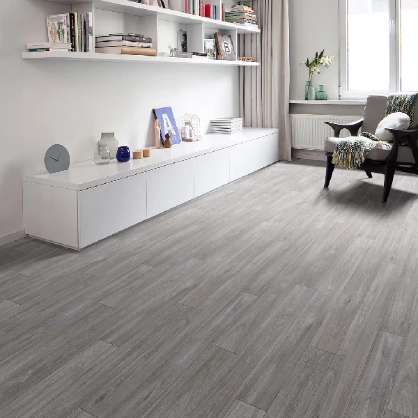 weathered wood-look vinyl flooring in a minimalist living room.